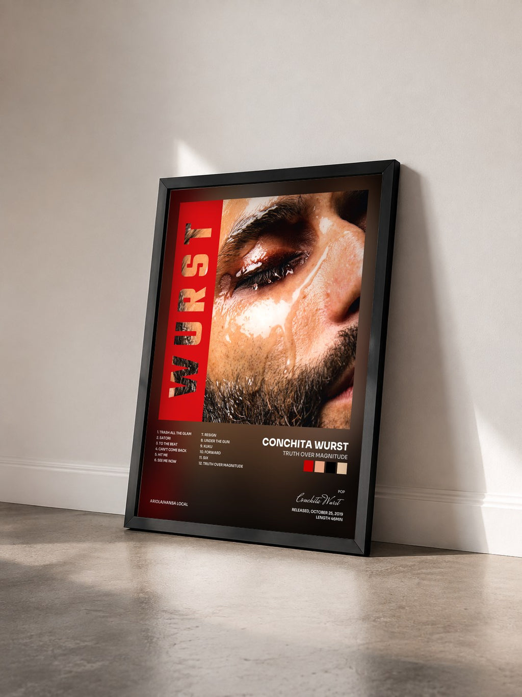 #noir Tableau de l'album Truth Over Magnitude de Conchita Wurst vu de trois quarts, cadre noir