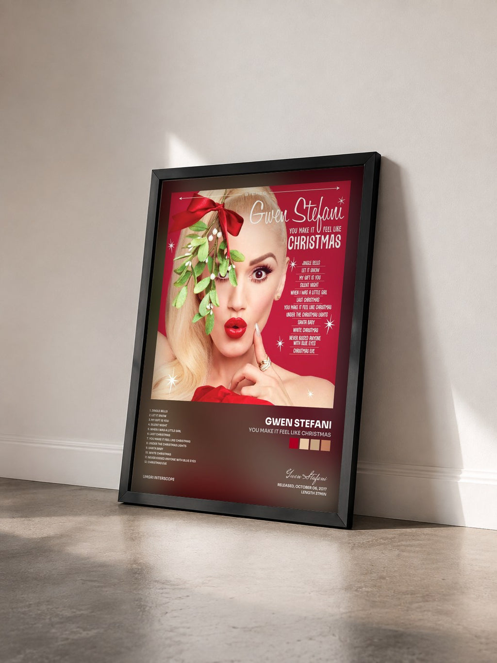 #noir Tableau de l'album You Make It Feel Like Christmas de Gwen Stefani vu de trois quarts, cadre noir