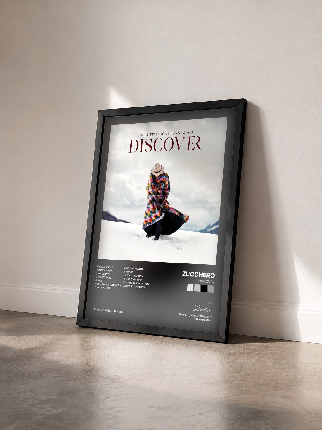 #noir Tableau de l'album Discover de Zucchero vu de trois quarts, cadre noir