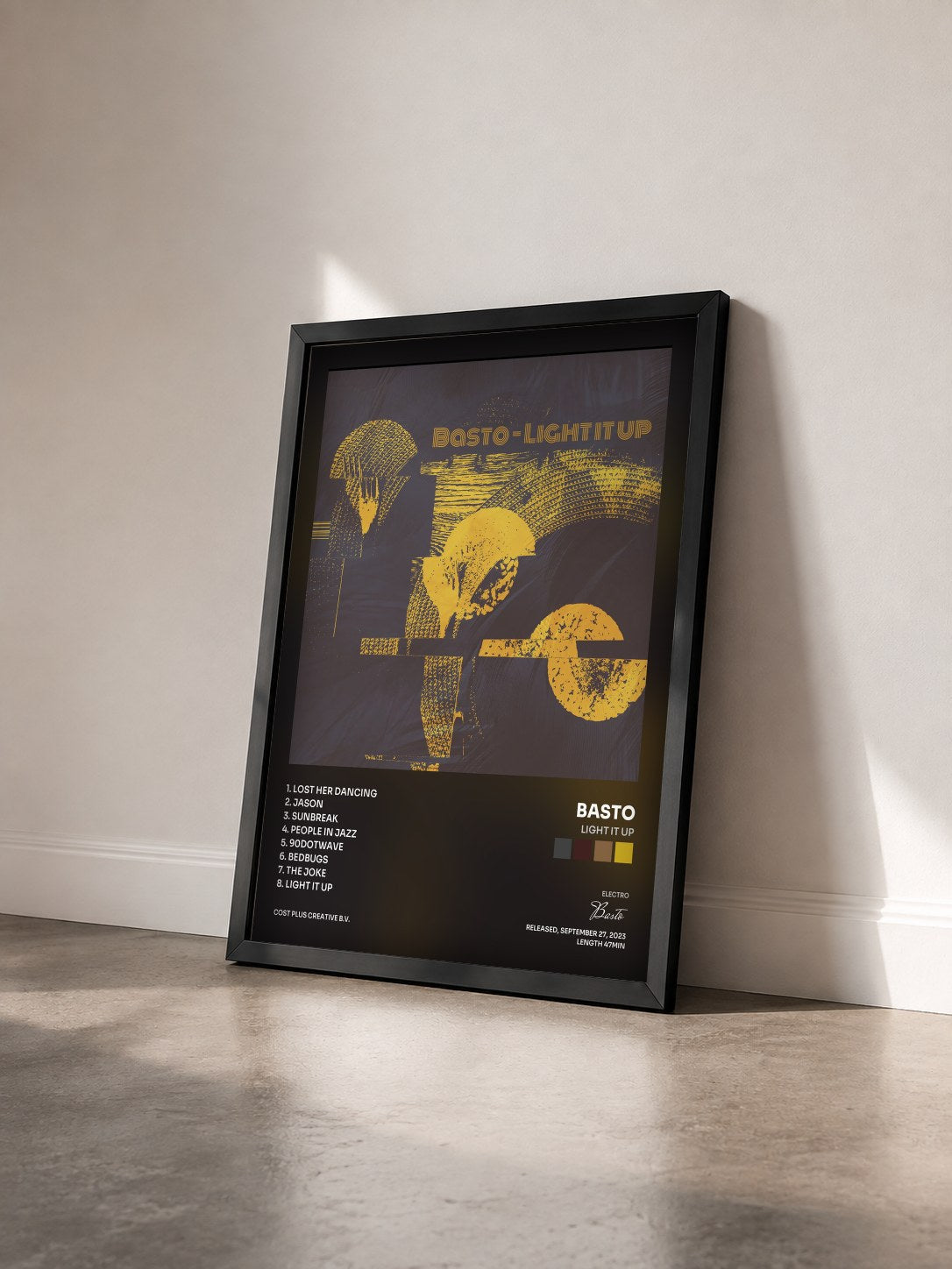 #noir Tableau de l'album Light It Up de Basto vu de trois quarts, cadre noir