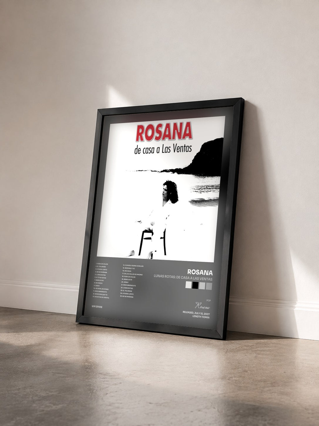 #noir Tableau de l'album Lunas Rotas: De casa a las ventas de Rosana vu de trois quarts, cadre noir