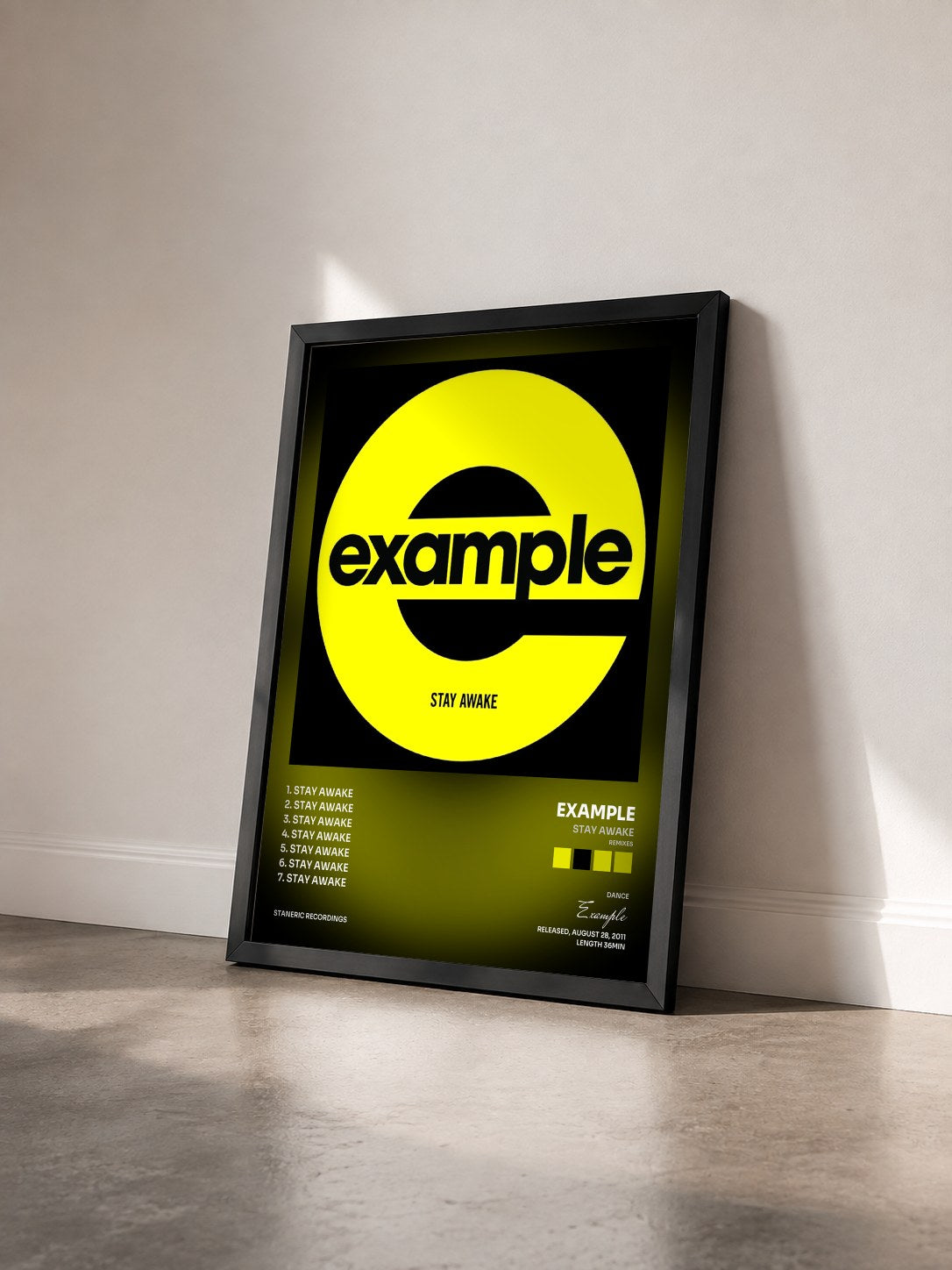 #noir Tableau de l'album Stay Awake (Remixes) de Example vu de trois quarts, cadre noir