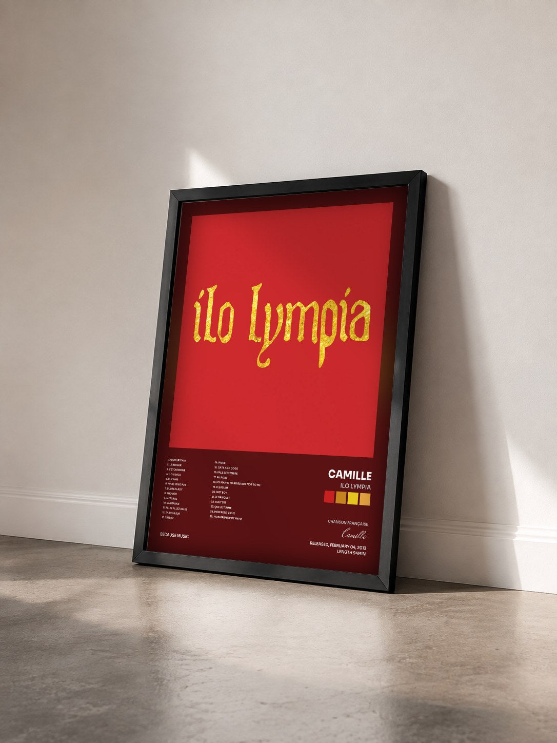 #noir Tableau de l'album Ilo Lympia de Camille vu de trois quarts, cadre noir