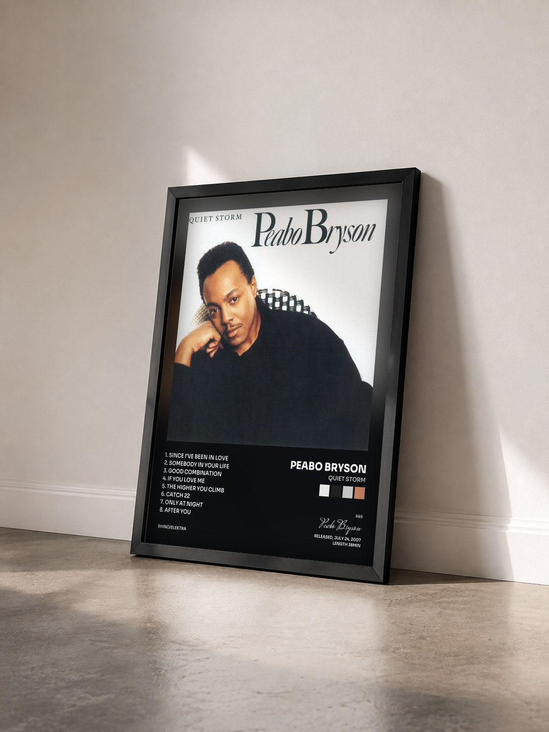 #noir Tableau de l'album Quiet Storm de Peabo Bryson vu de trois quarts, cadre noir