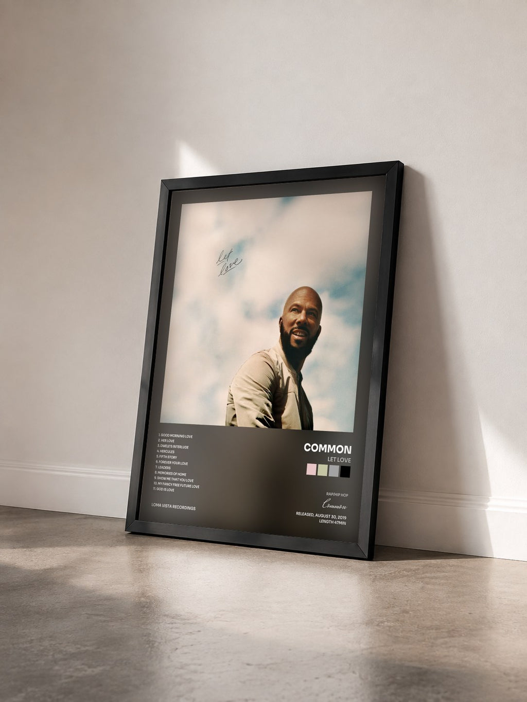 #noir Tableau de l'album Let Love de Common vu de trois quarts, cadre noir
