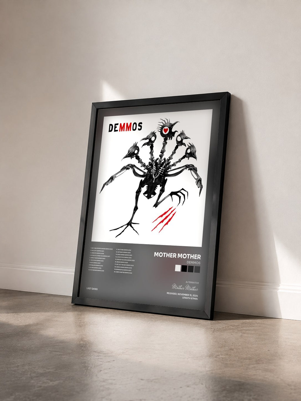 #noir Tableau de l'album DEMMOS de Mother Mother vu de trois quarts, cadre noir