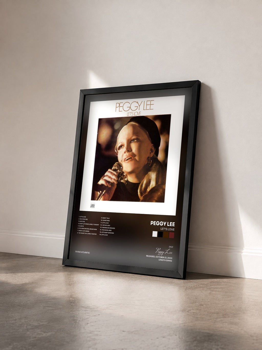 #noir Tableau de l'album Let's Love de Peggy Lee vu de trois quarts, cadre noir