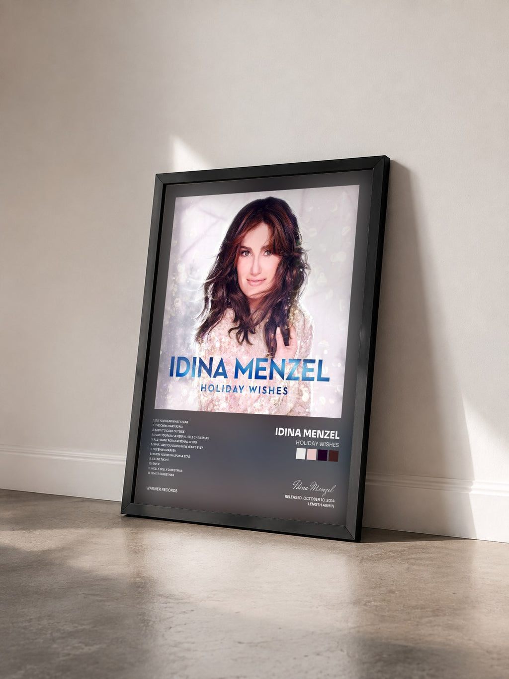 #noir Tableau de l'album Holiday Wishes de Idina Menzel vu de trois quarts, cadre noir