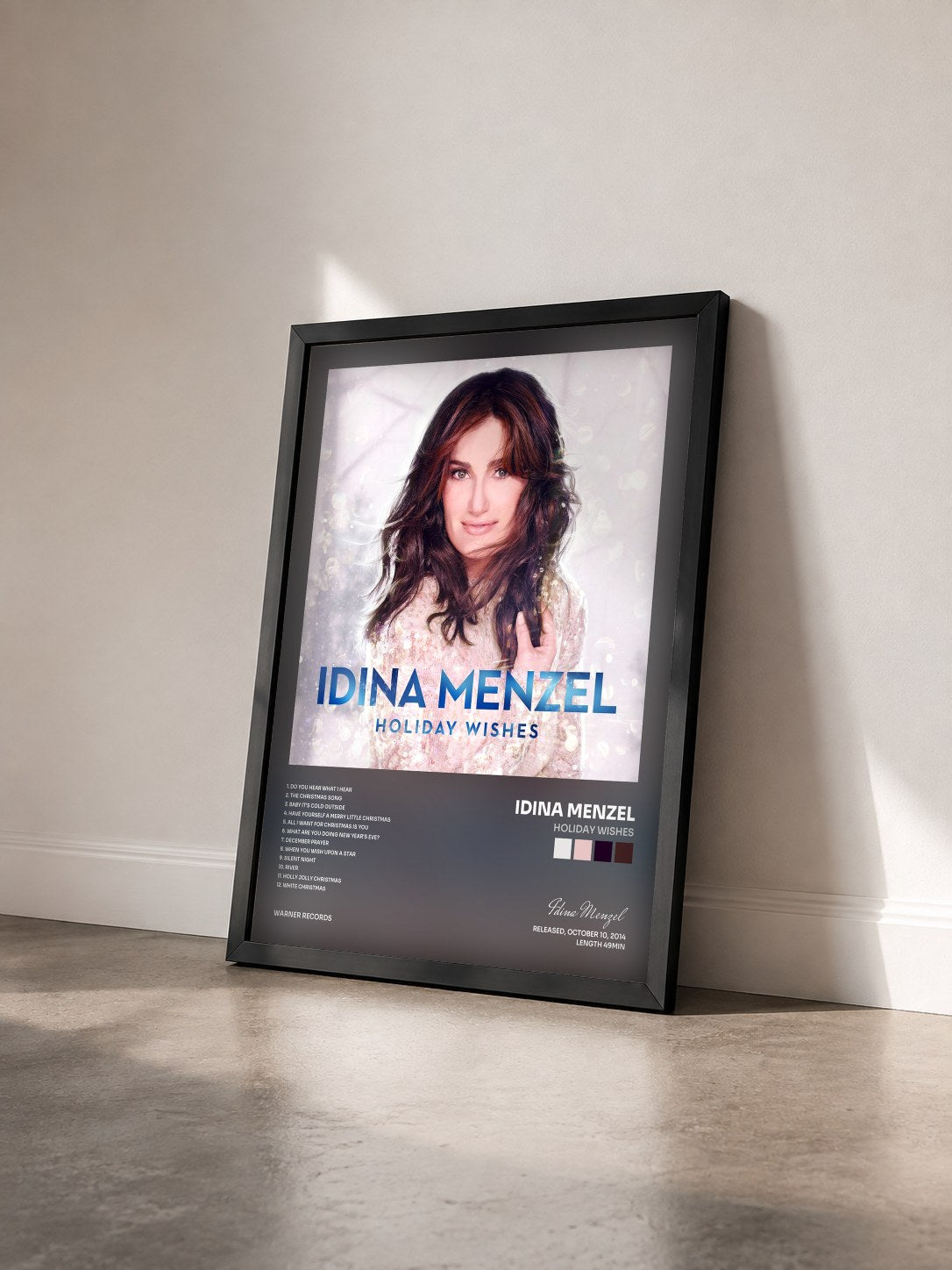 #noir Tableau de l'album Holiday Wishes de Idina Menzel vu de trois quarts, cadre noir