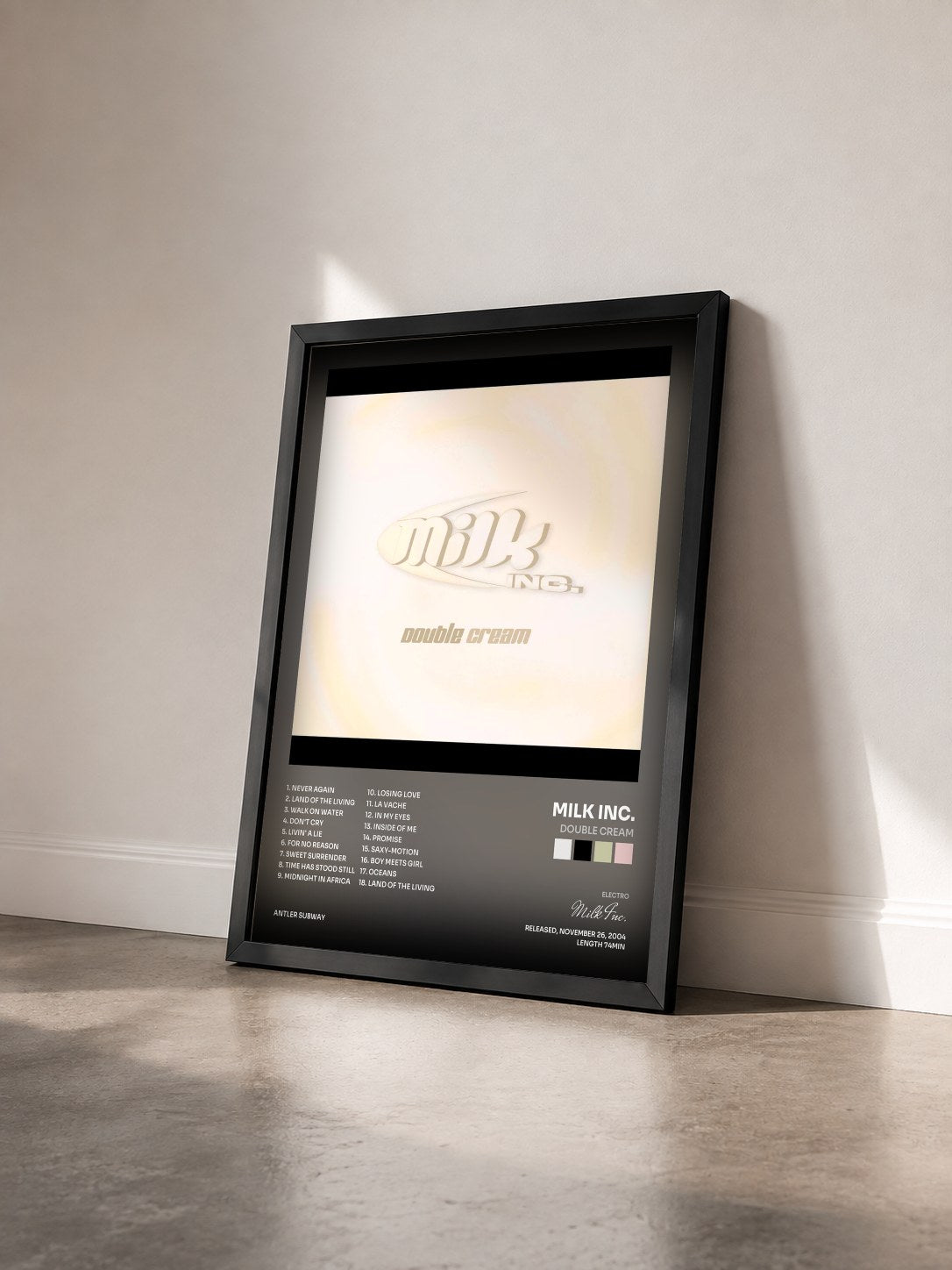 #noir Tableau de l'album Double Cream de Milk Inc. vu de trois quarts, cadre noir