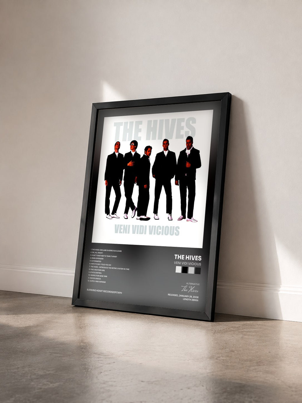 #noir Tableau de l'album Veni Vidi Vicious de The Hives vu de trois quarts, cadre noir