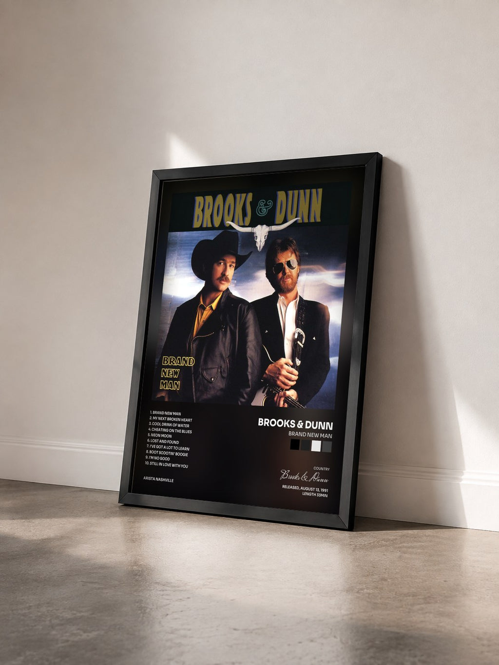 #noir Tableau de l'album Brand New Man de Brooks & Dunn vu de trois quarts, cadre noir