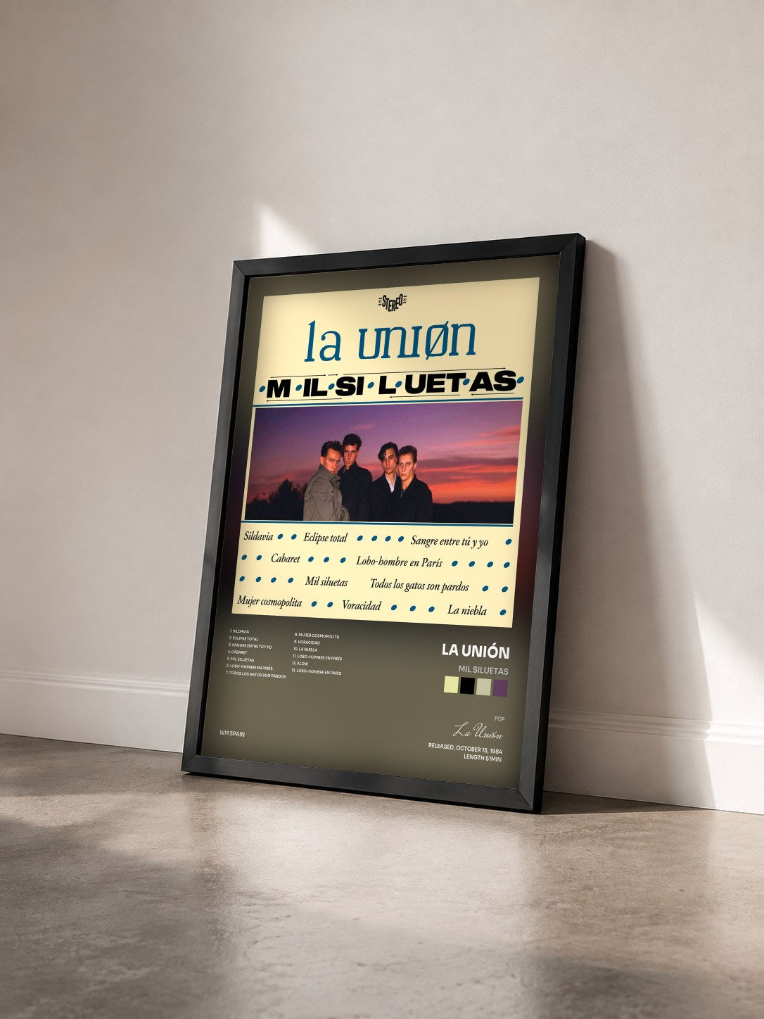 #noir Tableau de l'album Mil Siluetas de La Unión vu de trois quarts, cadre noir