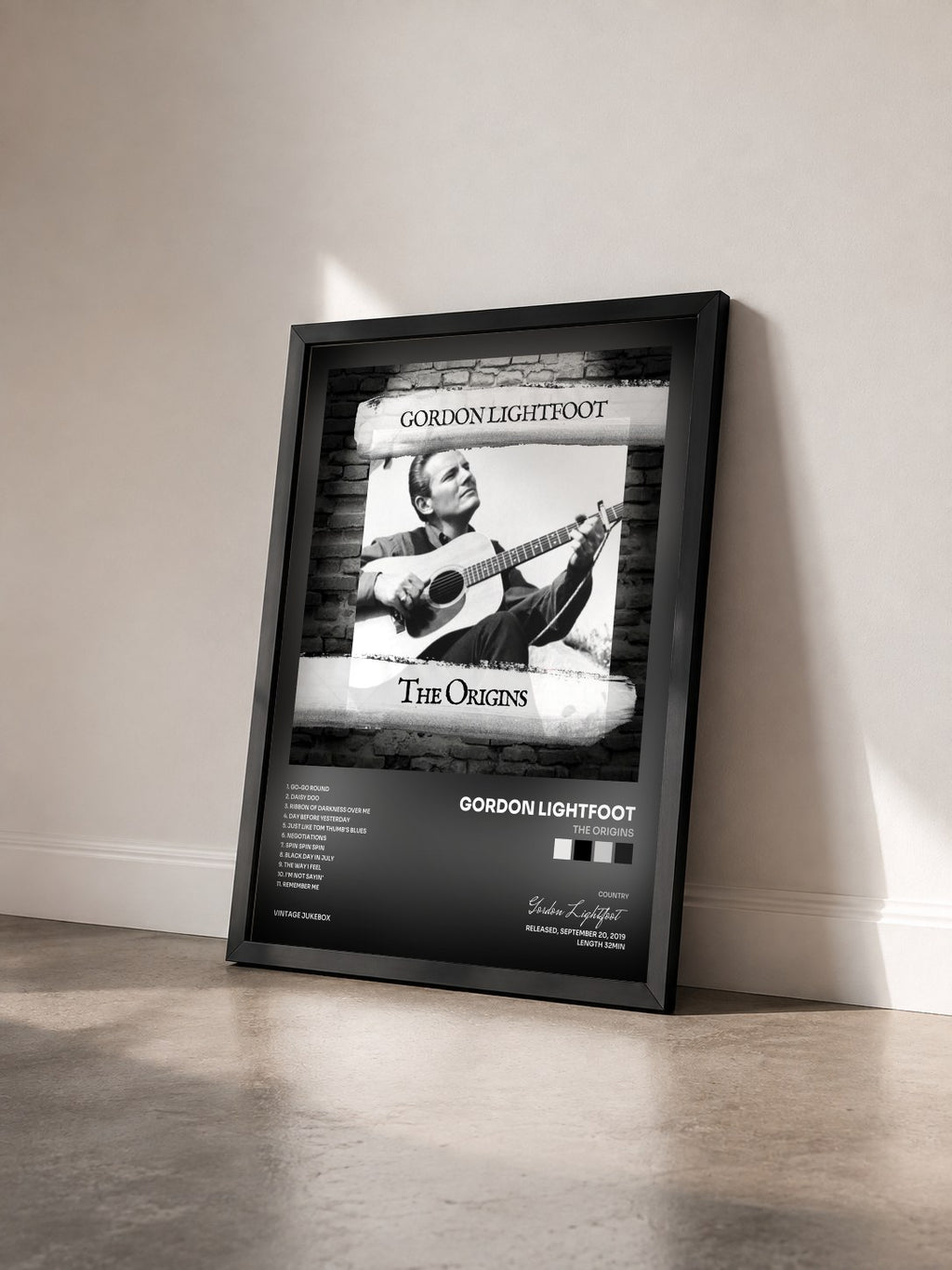 #noir Tableau de l'album The Origins de Gordon Lightfoot vu de trois quarts, cadre noir