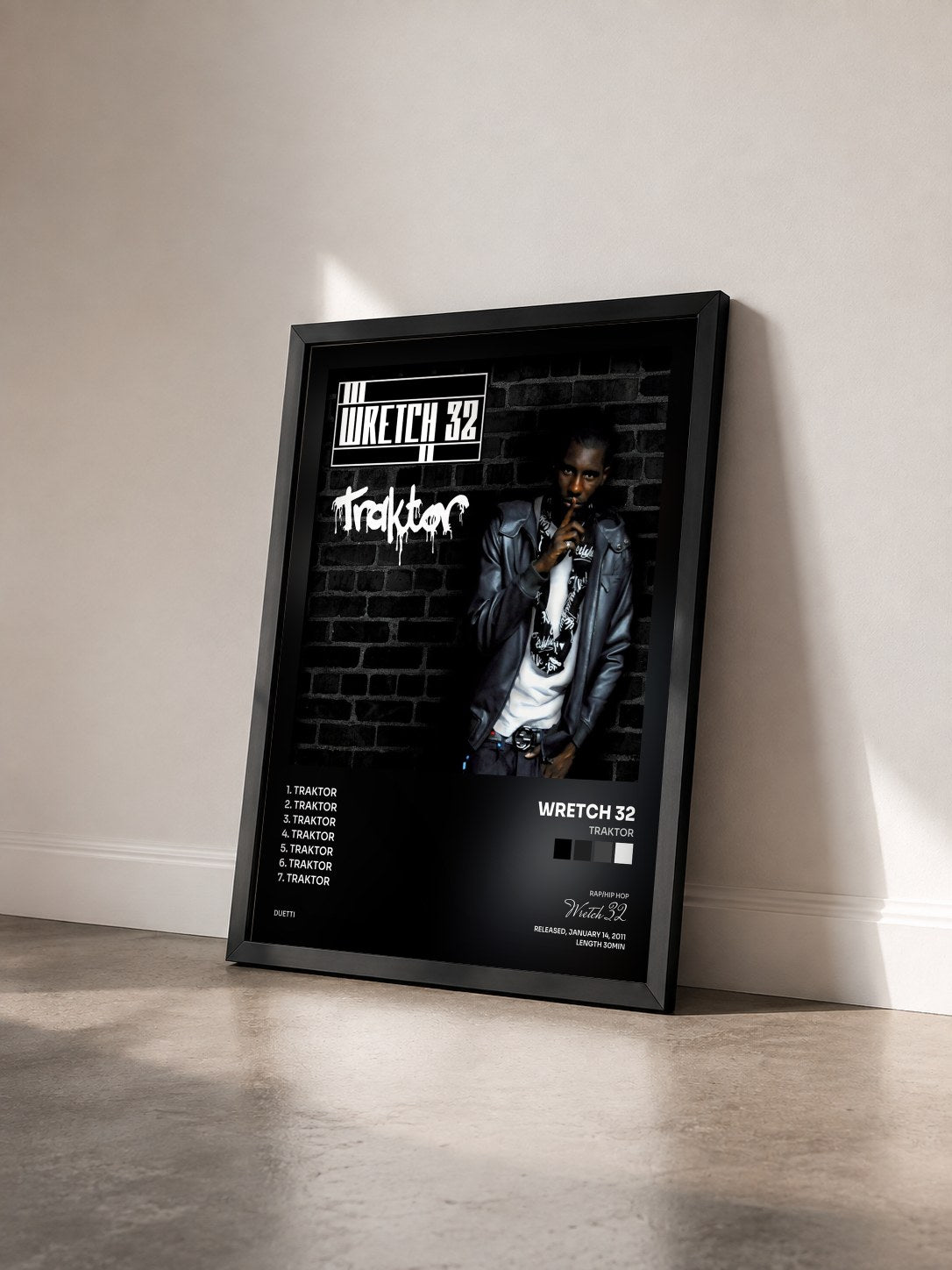 #noir Tableau de l'album Traktor de Wretch 32 vu de trois quarts, cadre noir