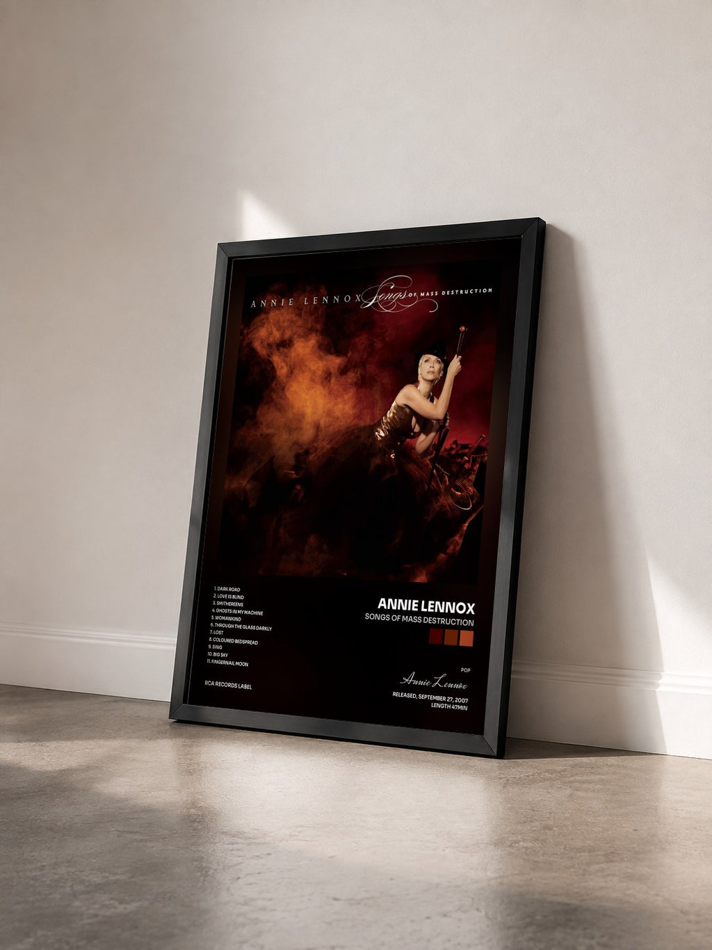 #noir Tableau de l'album Songs of Mass Destruction de Annie Lennox vu de trois quarts, cadre noir