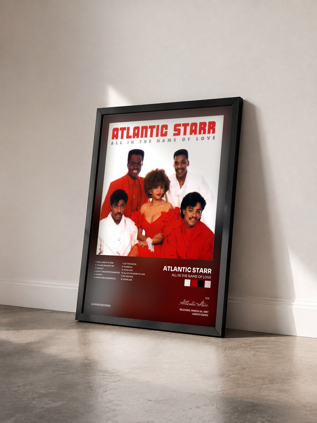 #noir Tableau de l'album All In The Name Of Love de Atlantic Starr vu de trois quarts, cadre noir