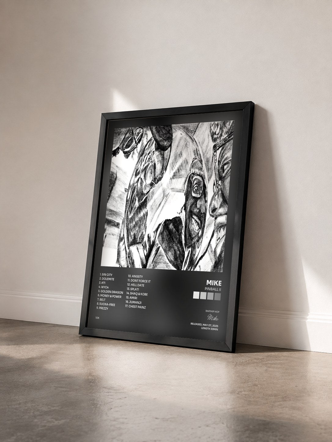 #noir Tableau de l'album Pinball II de Mike vu de trois quarts, cadre noir