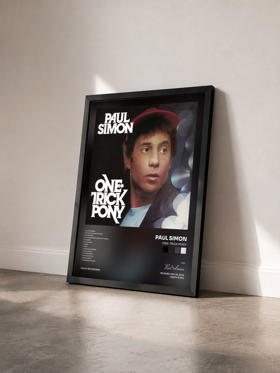 #noir Tableau de l'album One-Trick Pony de Paul Simon vu de trois quarts, cadre noir