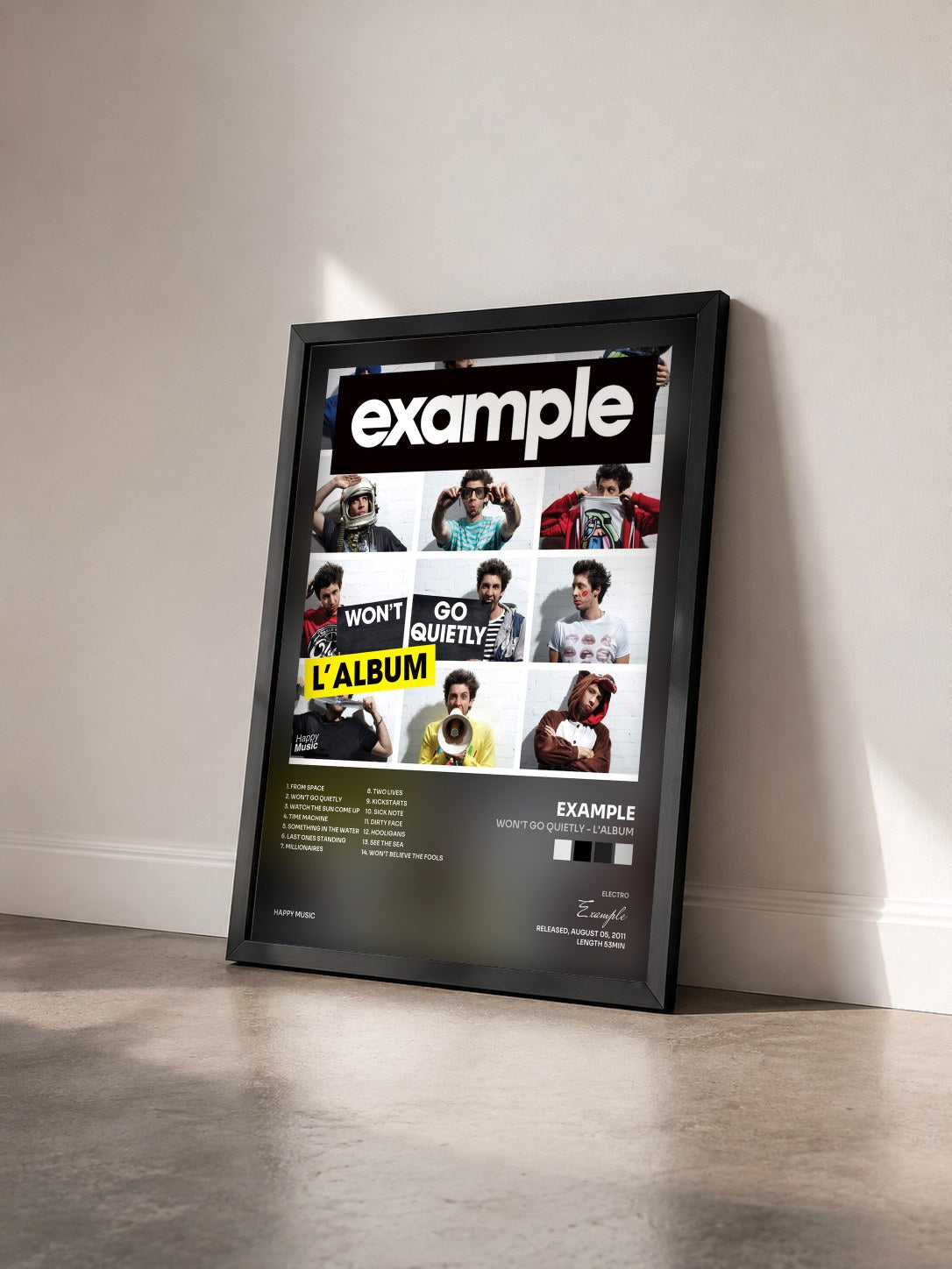 #noir Tableau de l'album Won't Go Quietly - L'album de Example vu de trois quarts, cadre noir