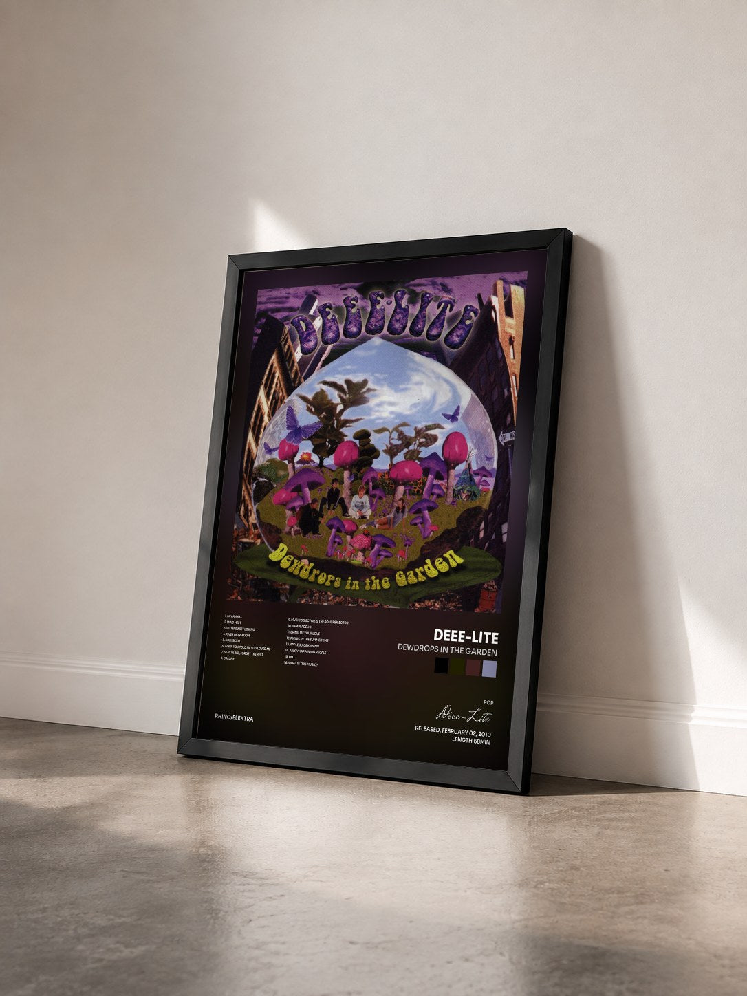 #noir Tableau de l'album Dewdrops in the Garden de Deee-Lite vu de trois quarts, cadre noir