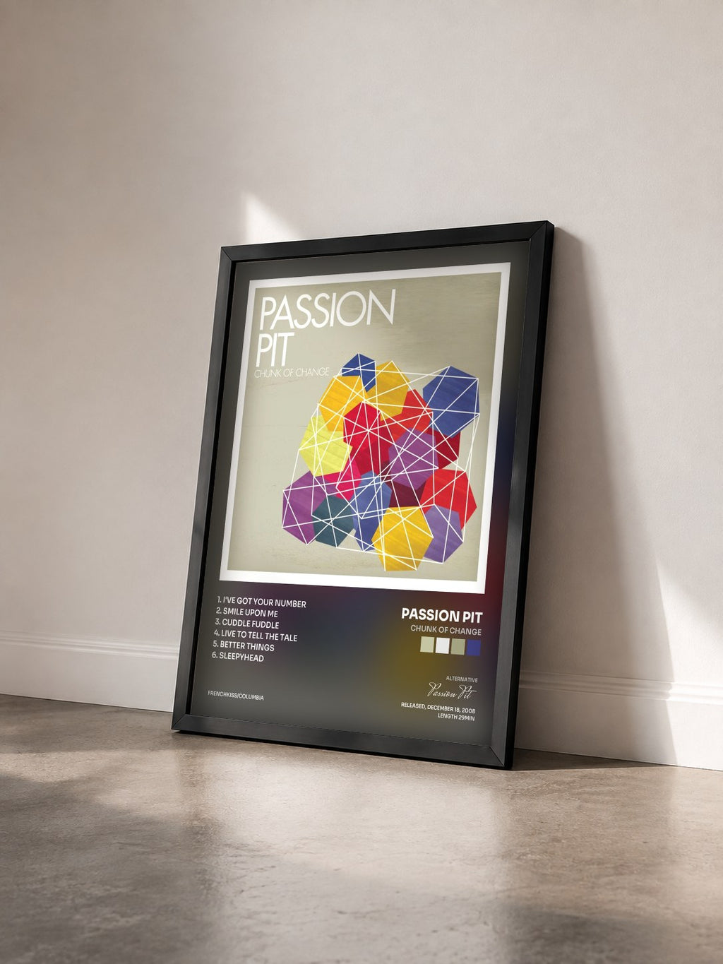 #noir Tableau de l'album Chunk of Change de Passion Pit vu de trois quarts, cadre noir