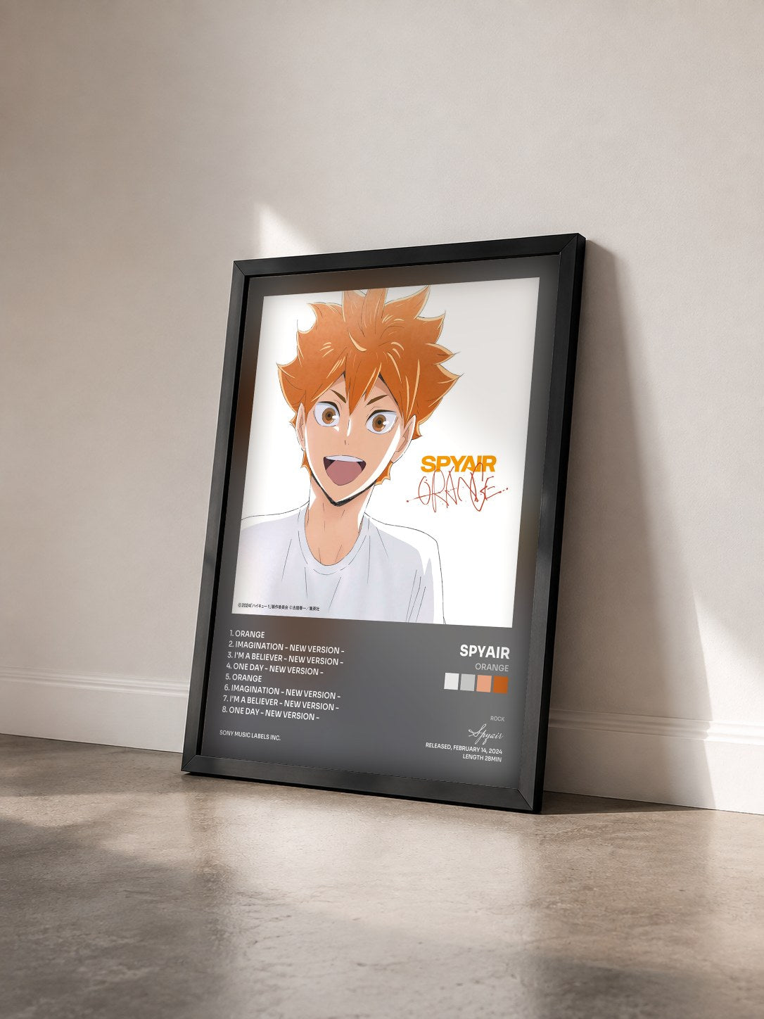 #noir Tableau de l'album Orange de Spyair vu de trois quarts, cadre noir