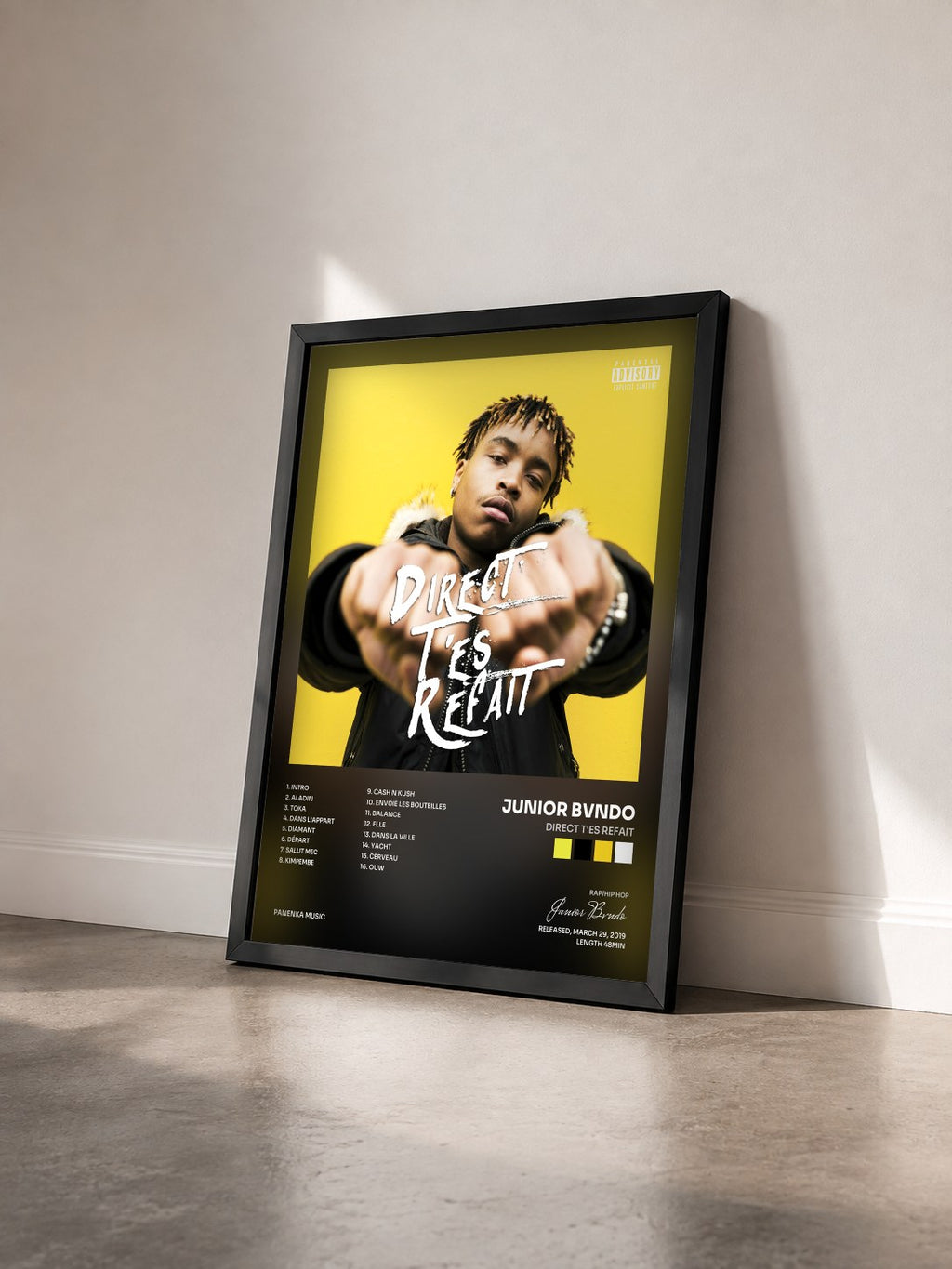 #noir Tableau de l'album Direct T'es Refait de Junior Bvndo vu de trois quarts, cadre noir