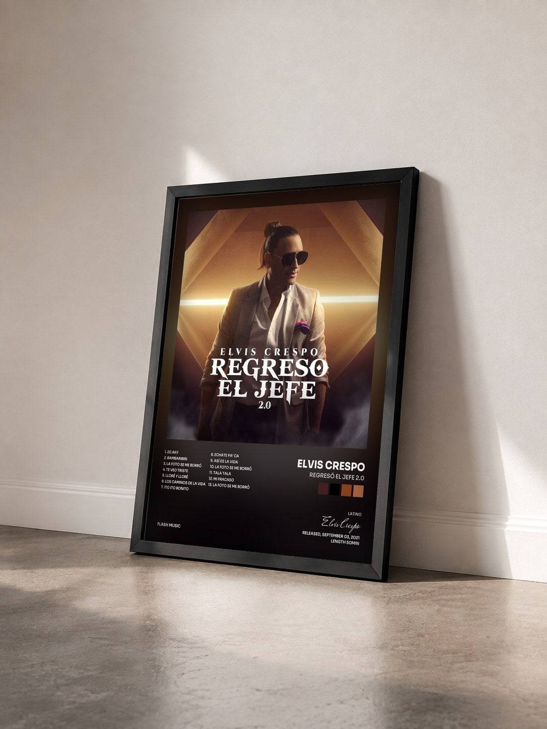 #noir Tableau de l'album Regresó el Jefe 2.0 de Elvis Crespo vu de trois quarts, cadre noir