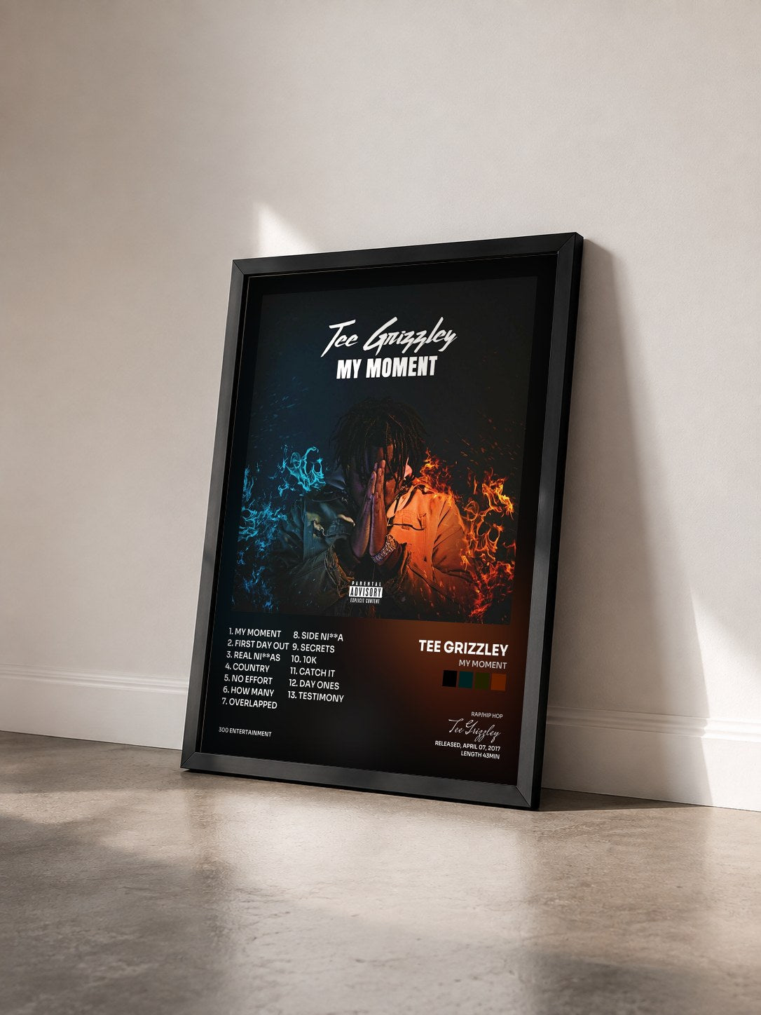 #noir Tableau de l'album My Moment de Tee Grizzley vu de trois quarts, cadre noir
