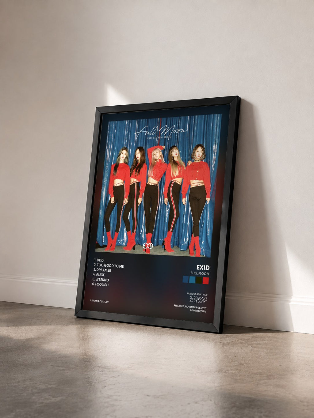 #noir Tableau de l'album Full Moon de EXID vu de trois quarts, cadre noir