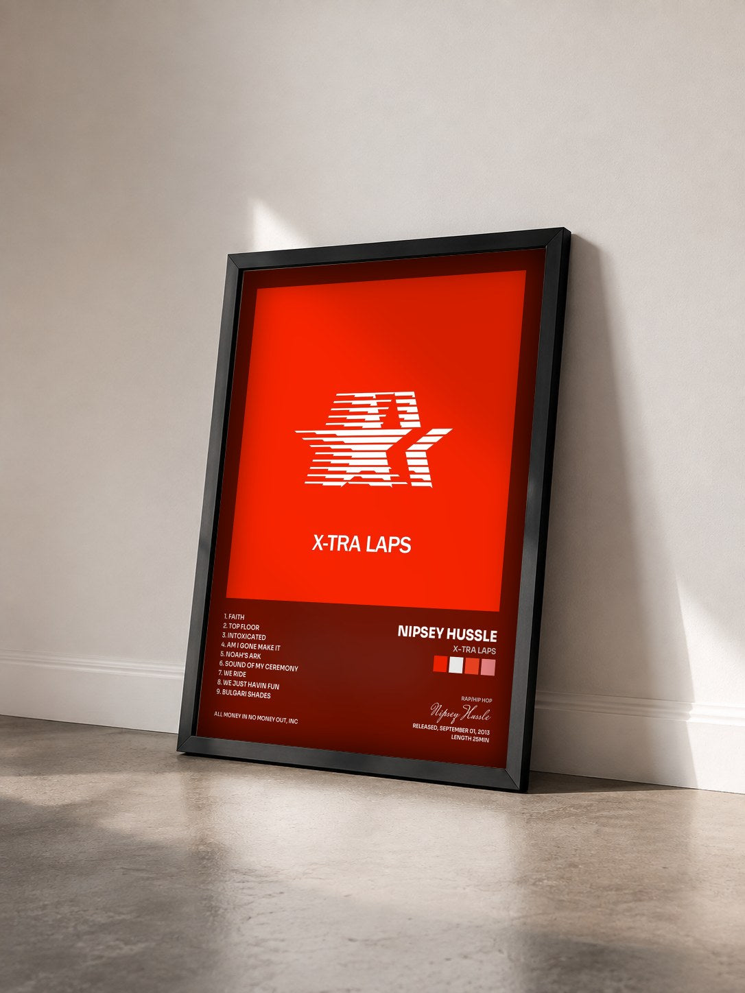 #noir Tableau de l'album X-Tra Laps de Nipsey Hussle vu de trois quarts, cadre noir