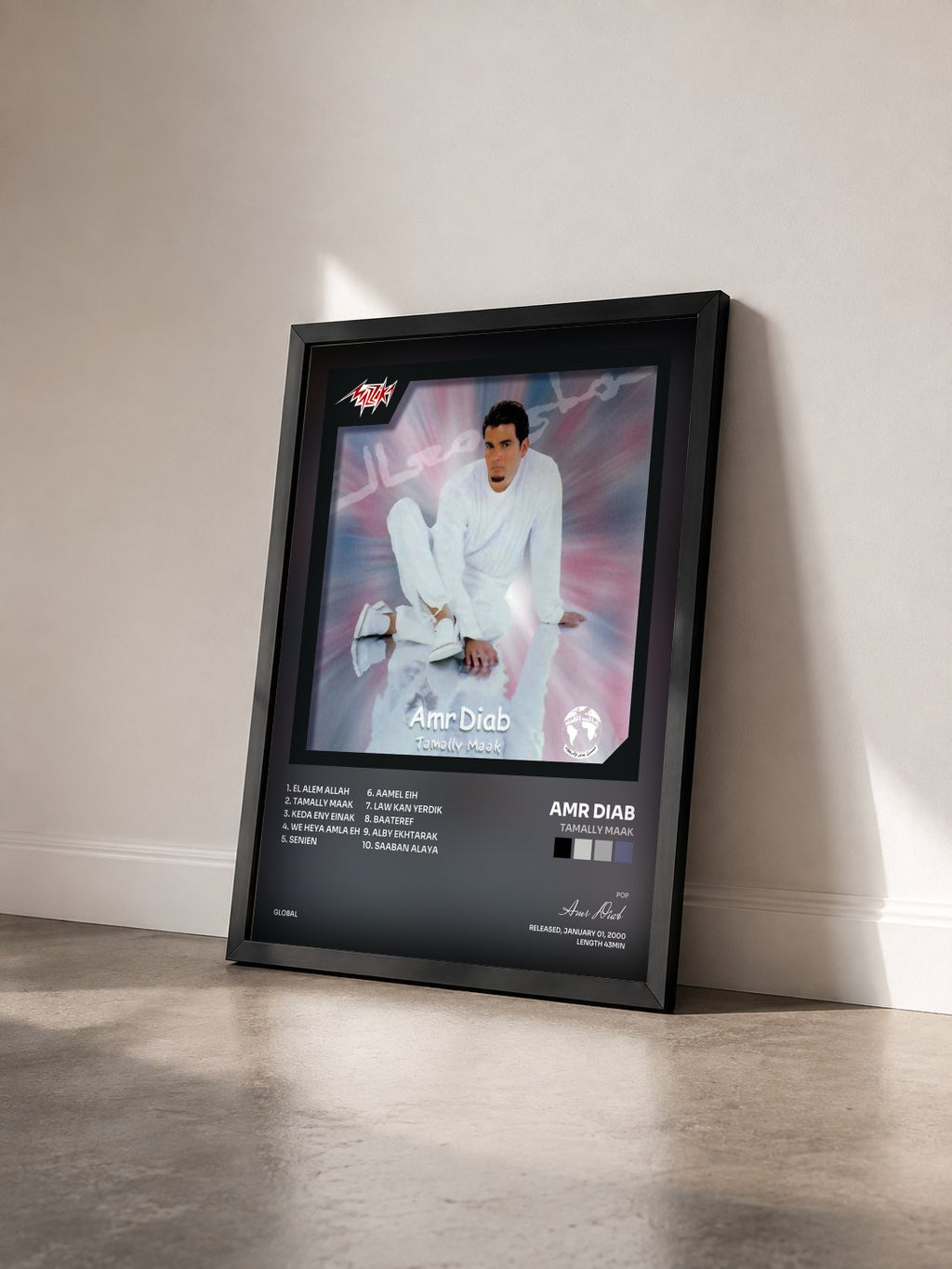 #noir Tableau de l'album Tamally Maak de Amr Diab vu de trois quarts, cadre noir