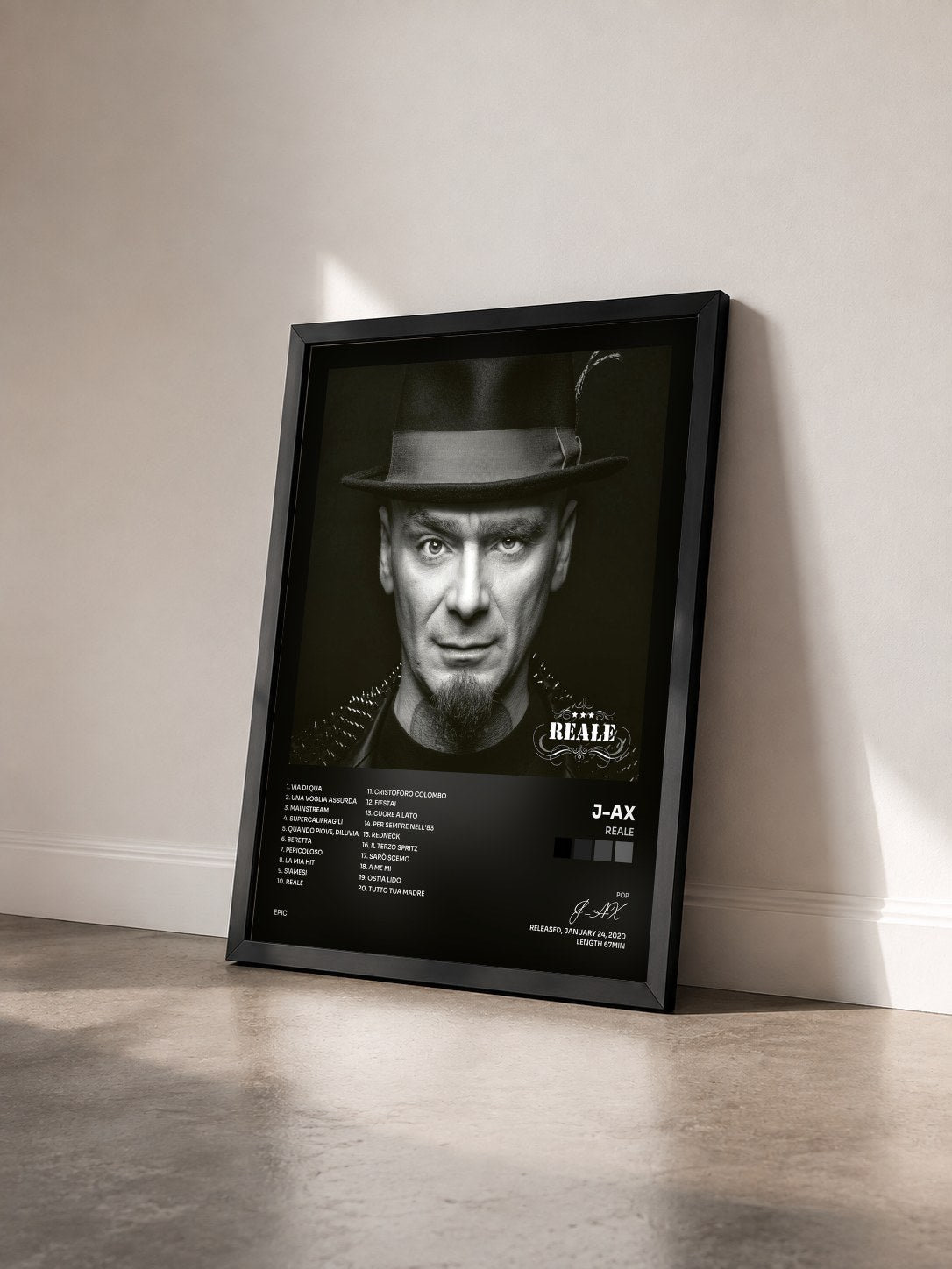 #noir Tableau de l'album ReAle de J-AX vu de trois quarts, cadre noir