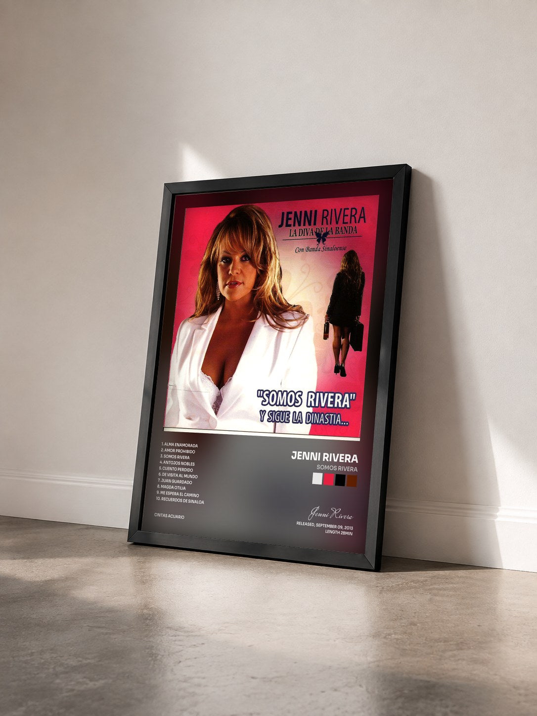 #noir Tableau de l'album Somos Rivera de Jenni Rivera vu de trois quarts, cadre noir
