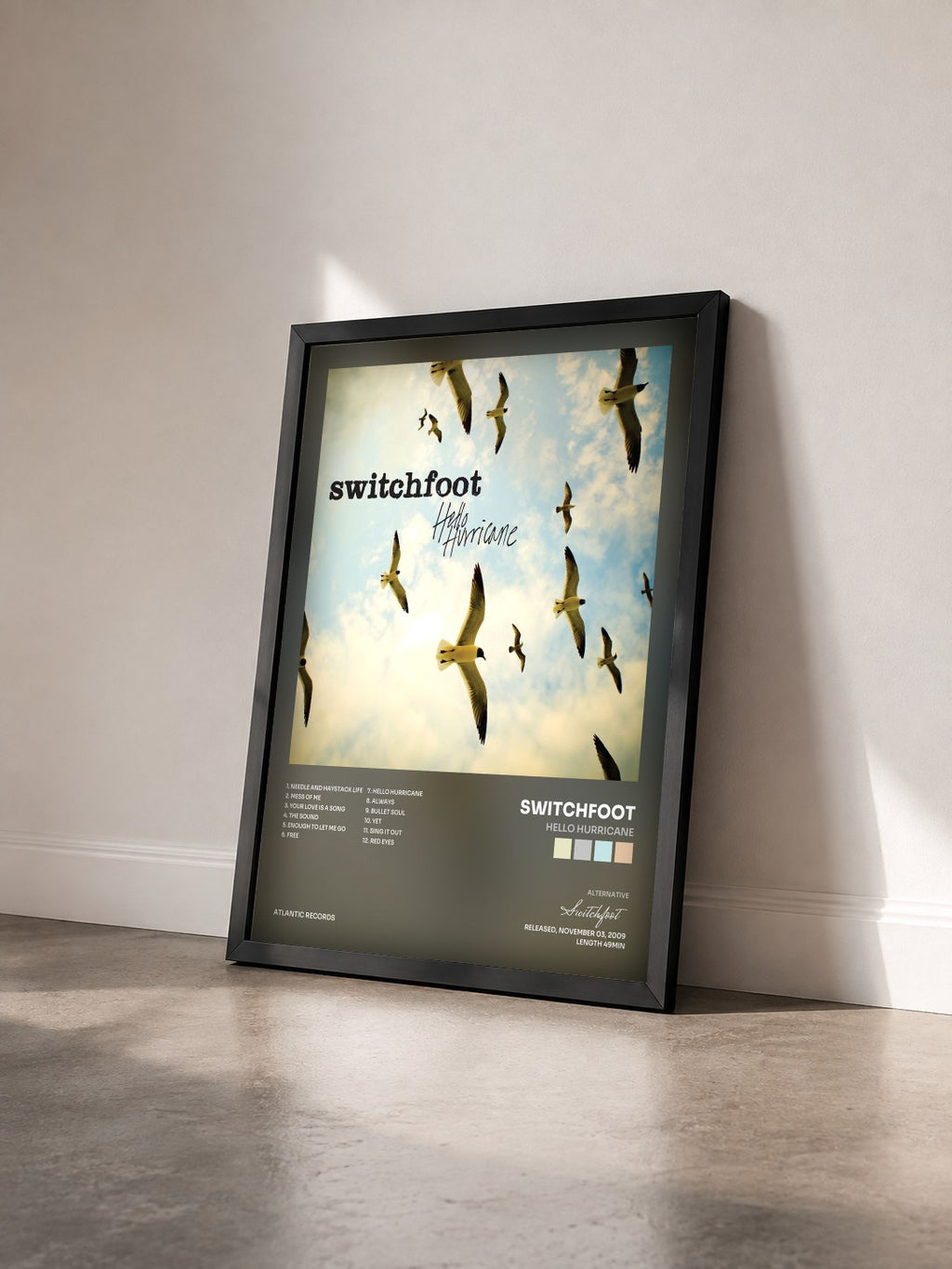 #noir Tableau de l'album Hello Hurricane de Switchfoot vu de trois quarts, cadre noir