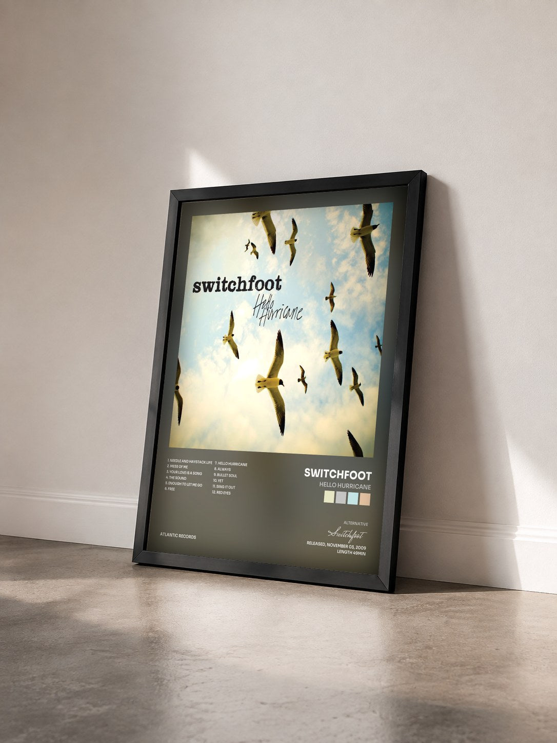 #noir Tableau de l'album Hello Hurricane de Switchfoot vu de trois quarts, cadre noir