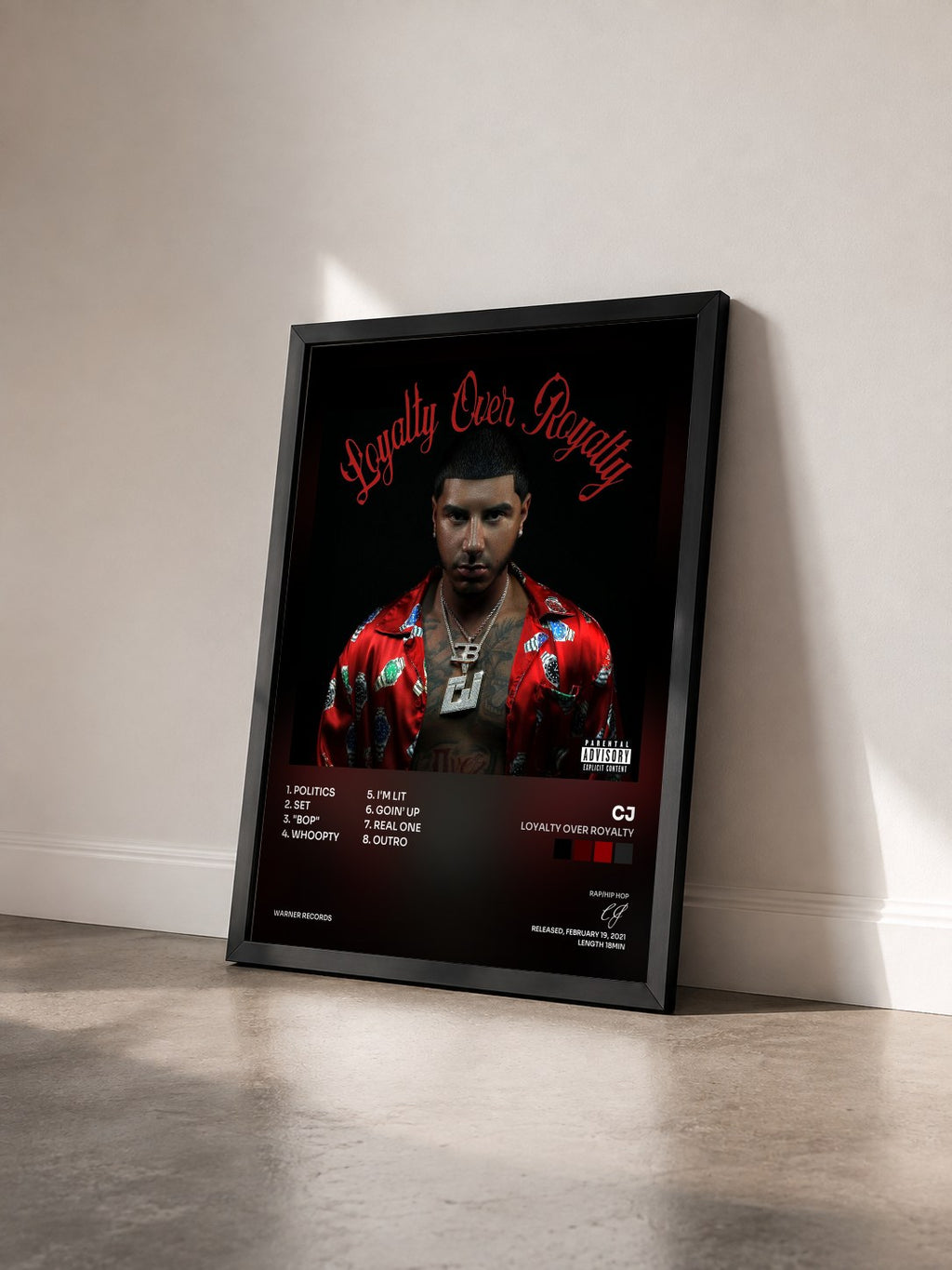 #noir Tableau de l'album Loyalty Over Royalty de CJ vu de trois quarts, cadre noir