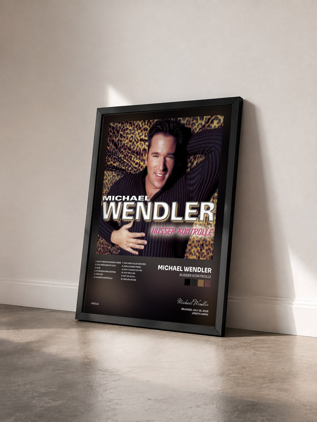 #noir Tableau de l'album Ausser Kontrolle de Michael Wendler vu de trois quarts, cadre noir