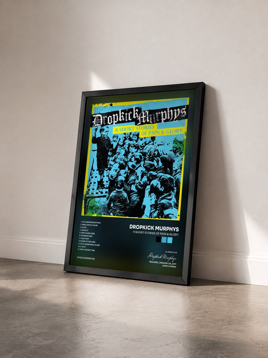 #noir Tableau de l'album 11 Short Stories of Pain & Glory de Dropkick Murphys vu de trois quarts, cadre noir