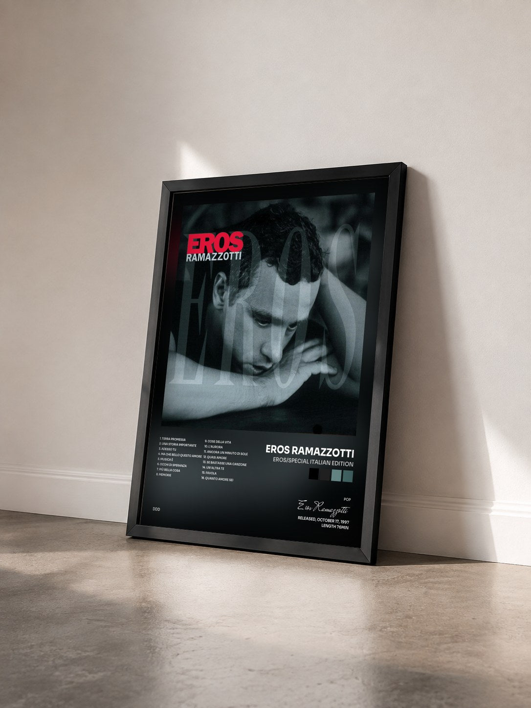 #noir Tableau de l'album Eros/Special Italian Edition de Eros Ramazzotti vu de trois quarts, cadre noir