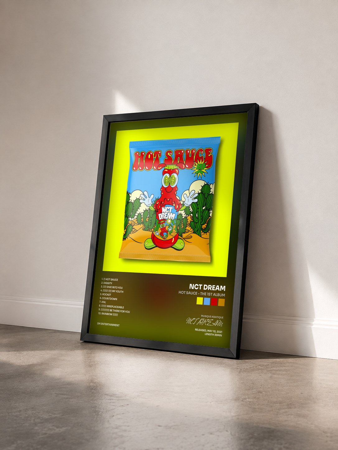 #noir Tableau de l'album Hot Sauce - The 1st Album de NCT DREAM vu de trois quarts, cadre noir