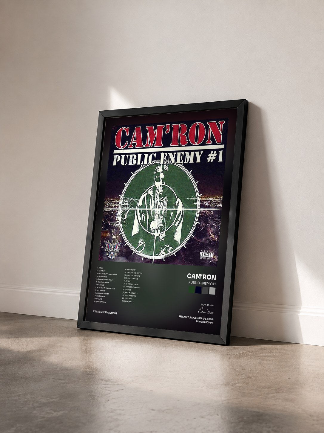 #noir Tableau de l'album Public Enemy #1 de Cam'ron vu de trois quarts, cadre noir