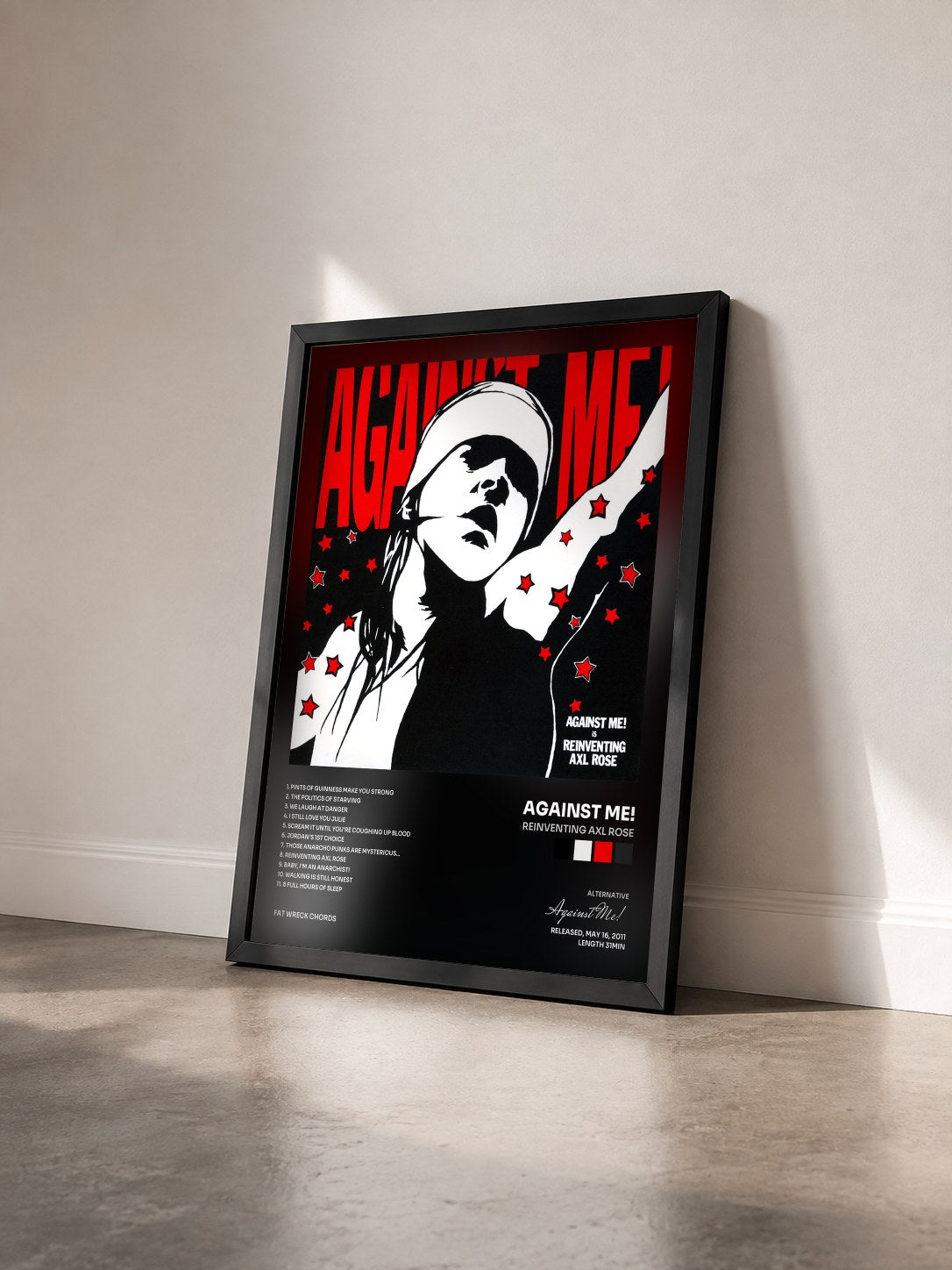 #noir Tableau de l'album Reinventing Axl Rose de Against Me! vu de trois quarts, cadre noir