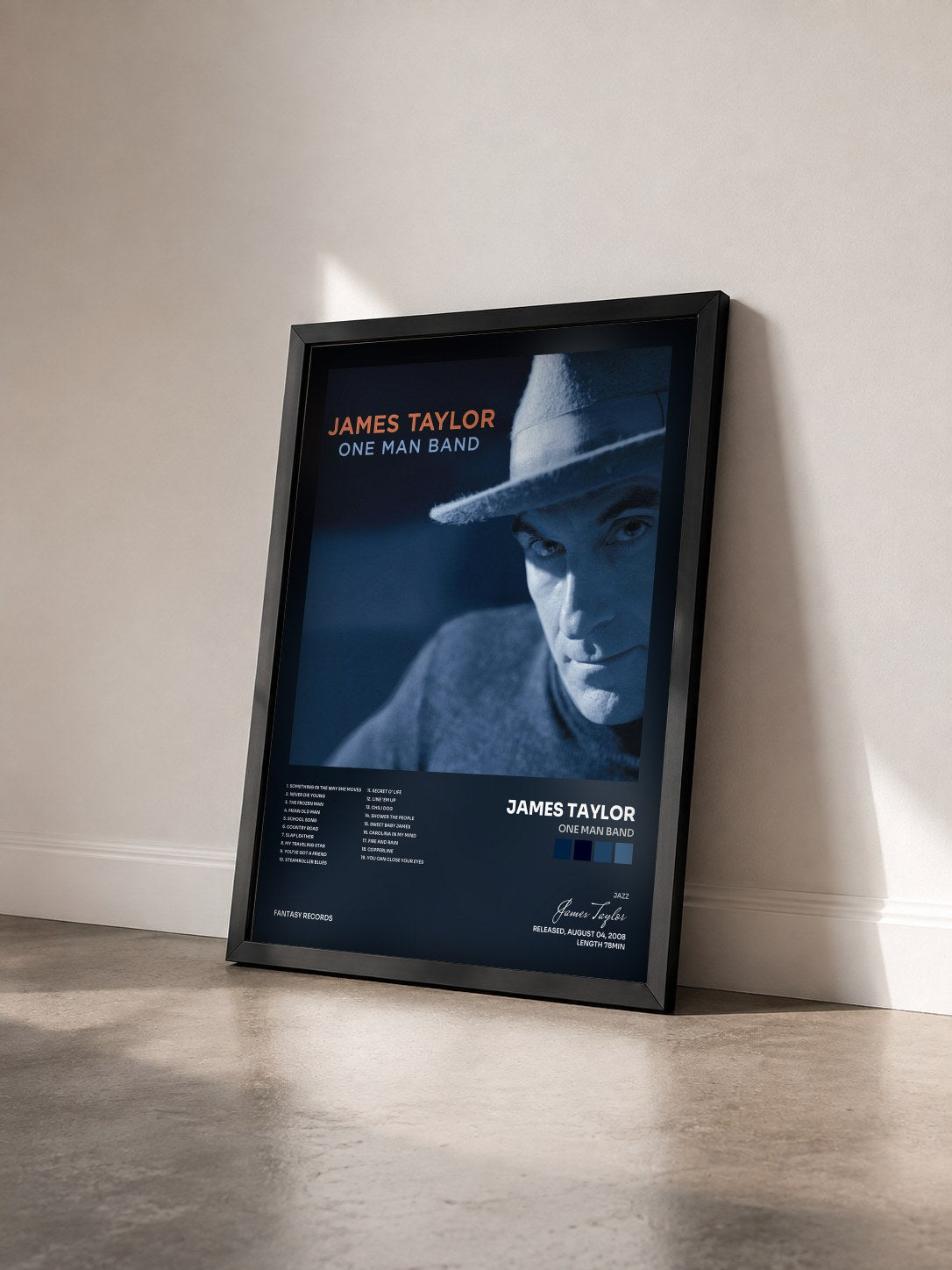 #noir Tableau de l'album One Man Band de James Taylor vu de trois quarts, cadre noir
