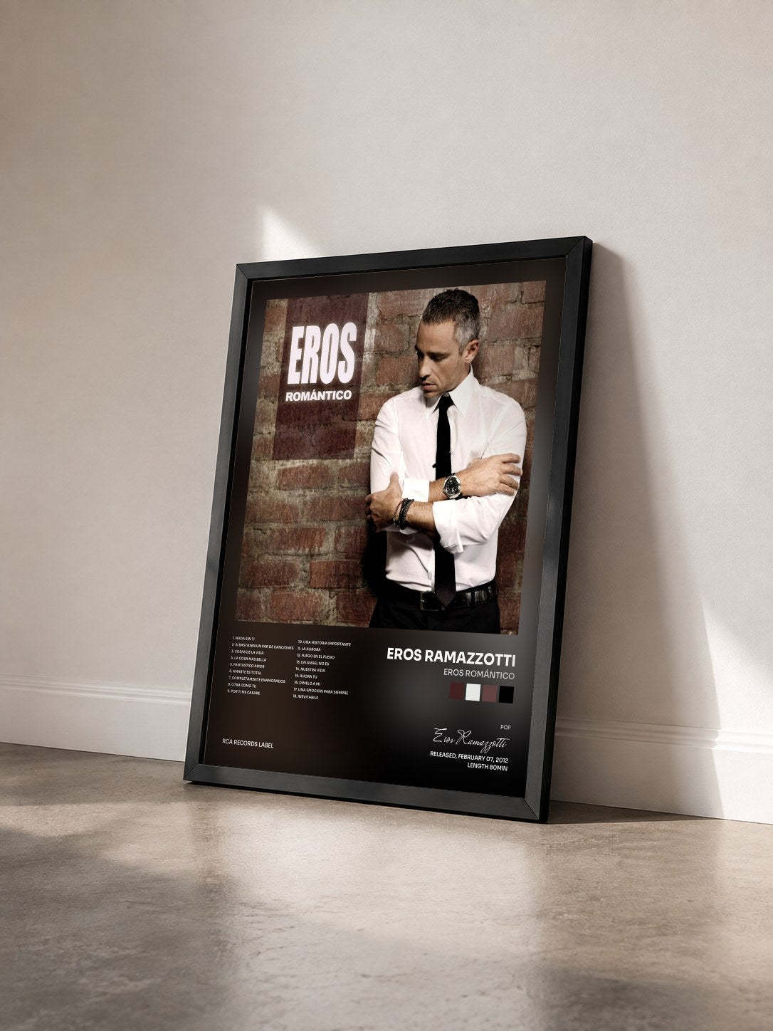 #noir Tableau de l'album Eros Romántico de Eros Ramazzotti vu de trois quarts, cadre noir