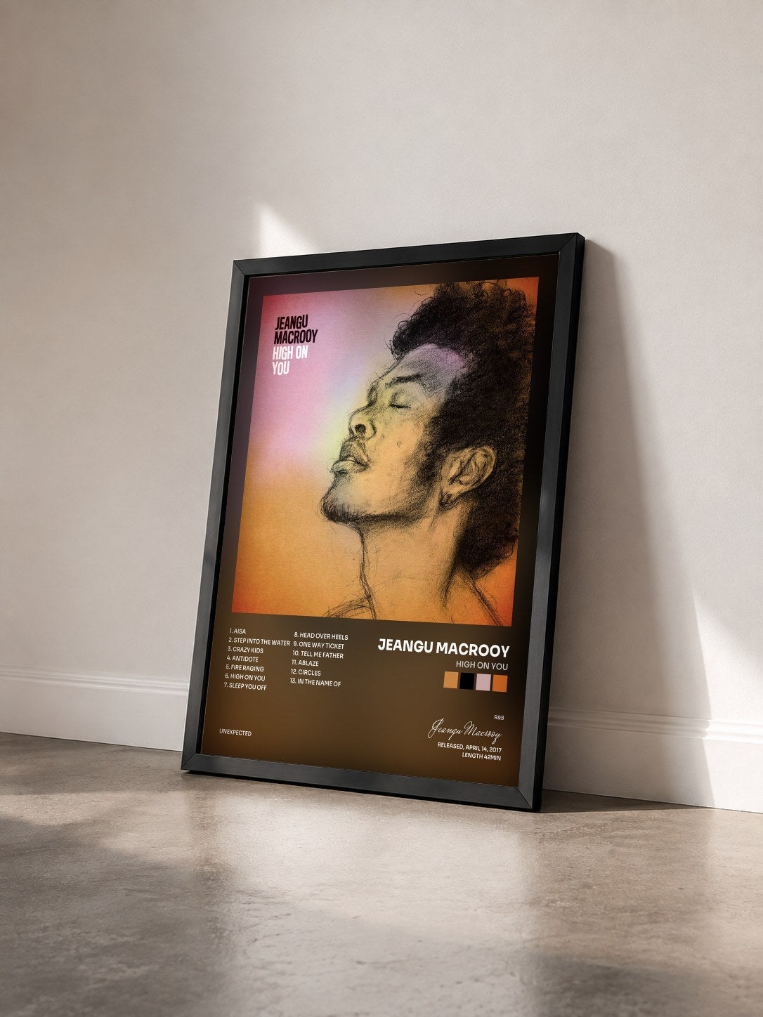 #noir Tableau de l'album High On You de Jeangu Macrooy vu de trois quarts, cadre noir