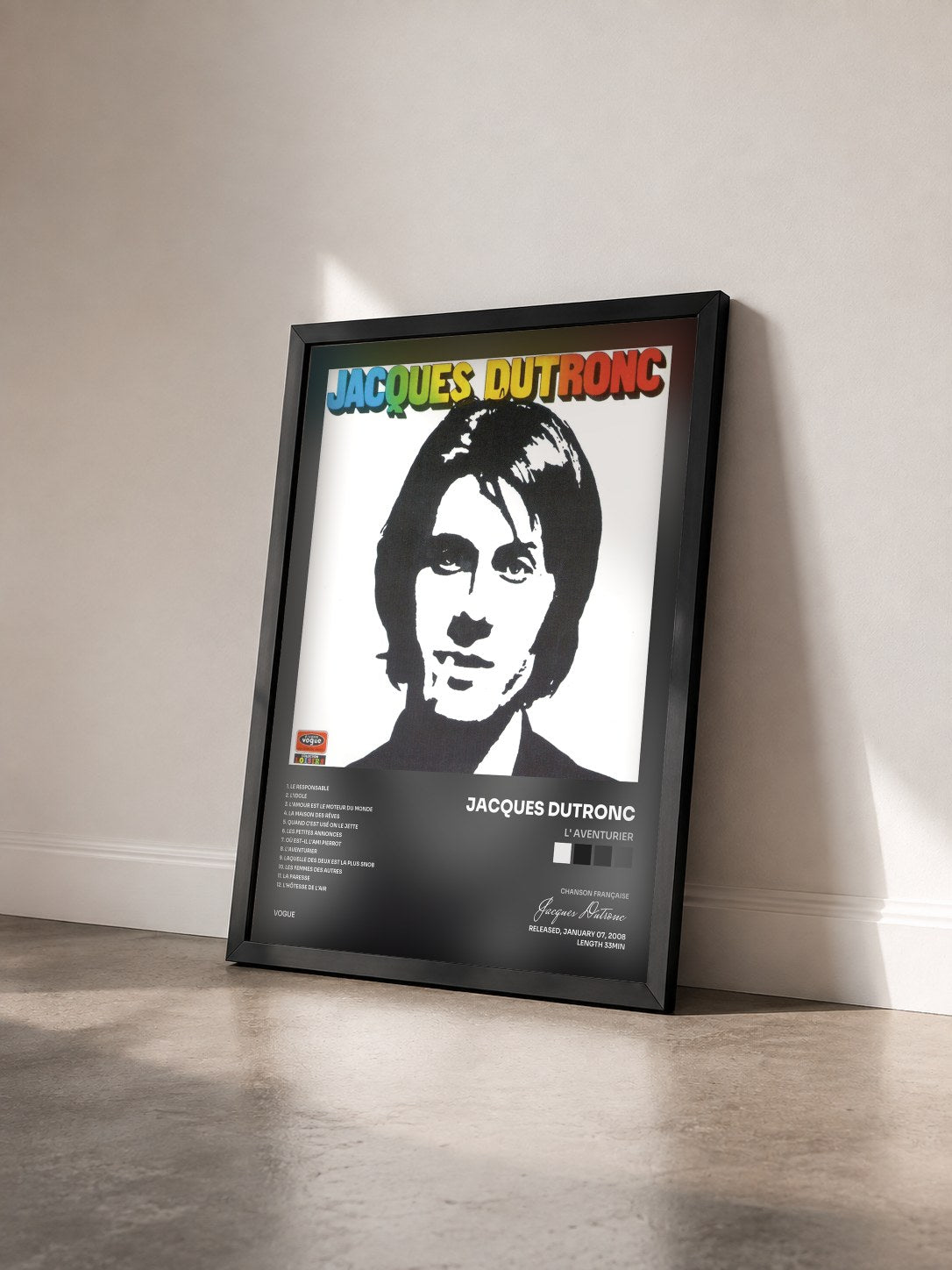 #noir Tableau de l'album L' aventurier de Jacques Dutronc vu de trois quarts, cadre noir