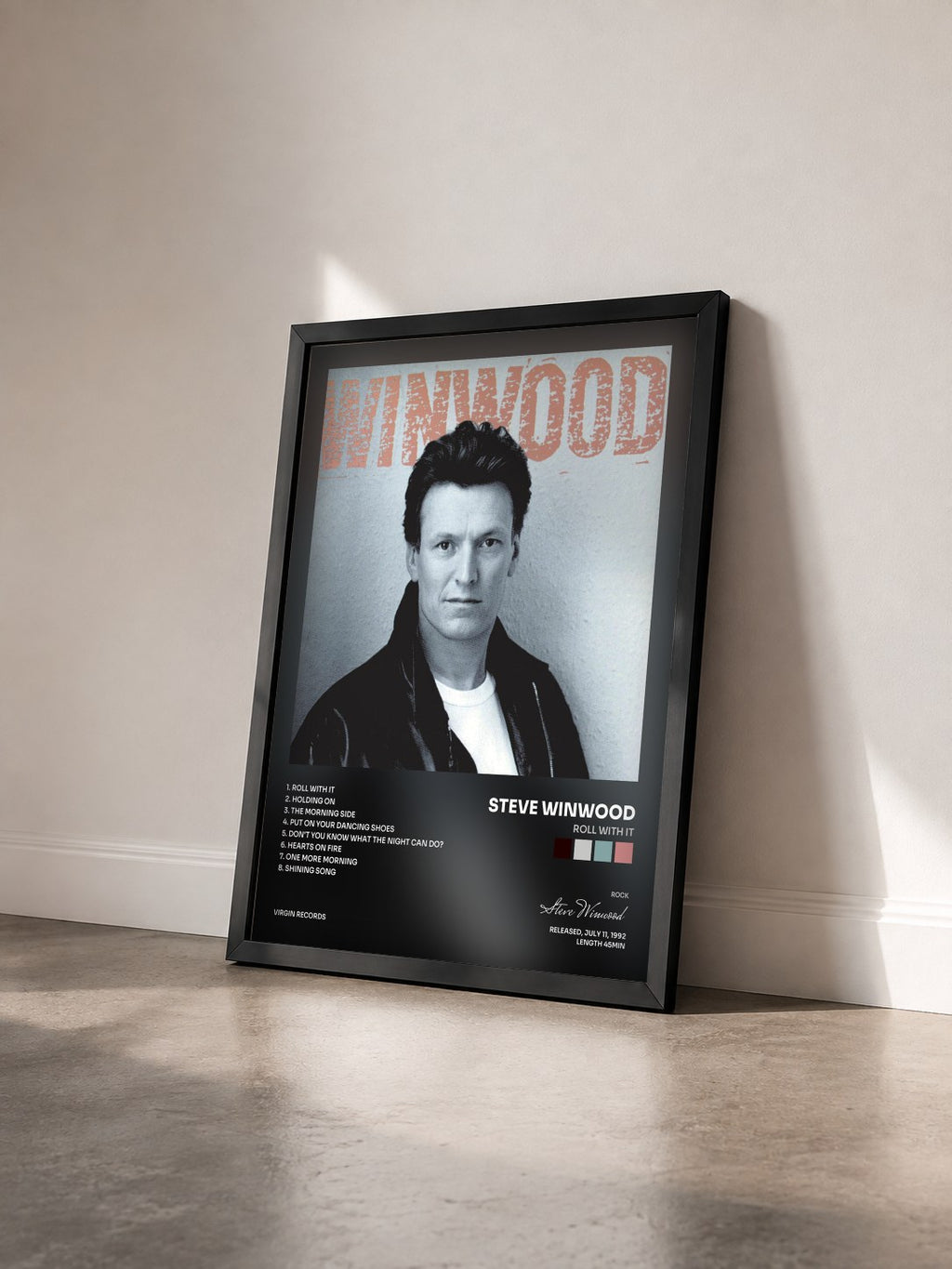 #noir Tableau de l'album Roll With It de Steve Winwood vu de trois quarts, cadre noir