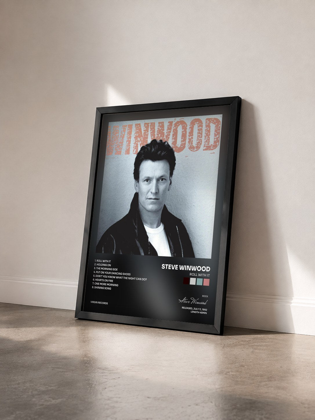 #noir Tableau de l'album Roll With It de Steve Winwood vu de trois quarts, cadre noir